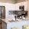 a kitchen with white cabinets