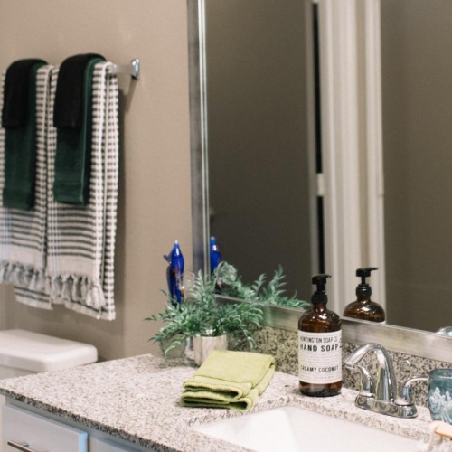 Bathroom options with thoughtful details a bathroom with a sink and mirror