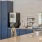 a kitchen with blue cabinets