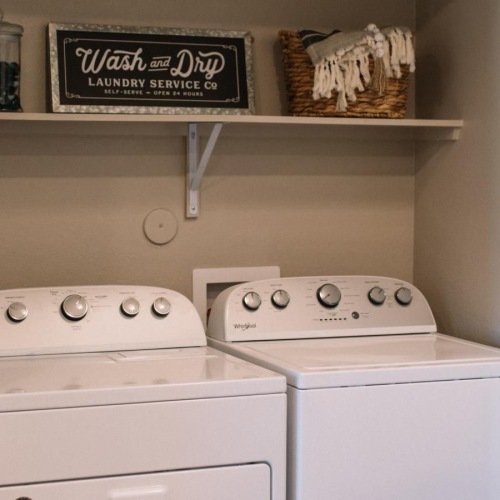 Everything you need right at your fingertips a small kitchen with a white stove